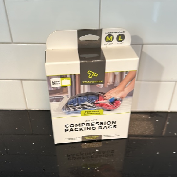 Compression Travel - Picture 2 of 4